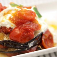 Parmigiana di Melanzane su letto di stracciatella di Bufala - Prime Querce Menù