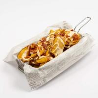 Chips croccanti di Patate con Fonduta di Grana e Guanciale di Suino nero - DiVino in Gusto alla Magione