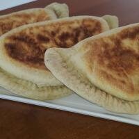 crescione patate, salsiccia e scamorza affumicata - Piadina.RE