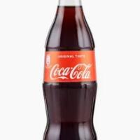 Coca Cola 33 cl - Pizzeria Pepe Nero