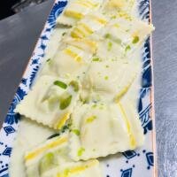 RAVIOLI AGLI AGRUMI - Divino Ristorante Vineria